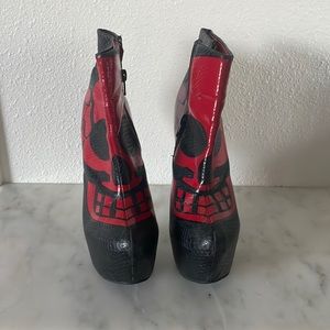 Black and red skull snake skin texture heals.